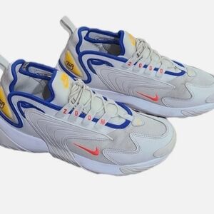 Nike Mens White Sneakers with Blue Trim & Yellow Accents